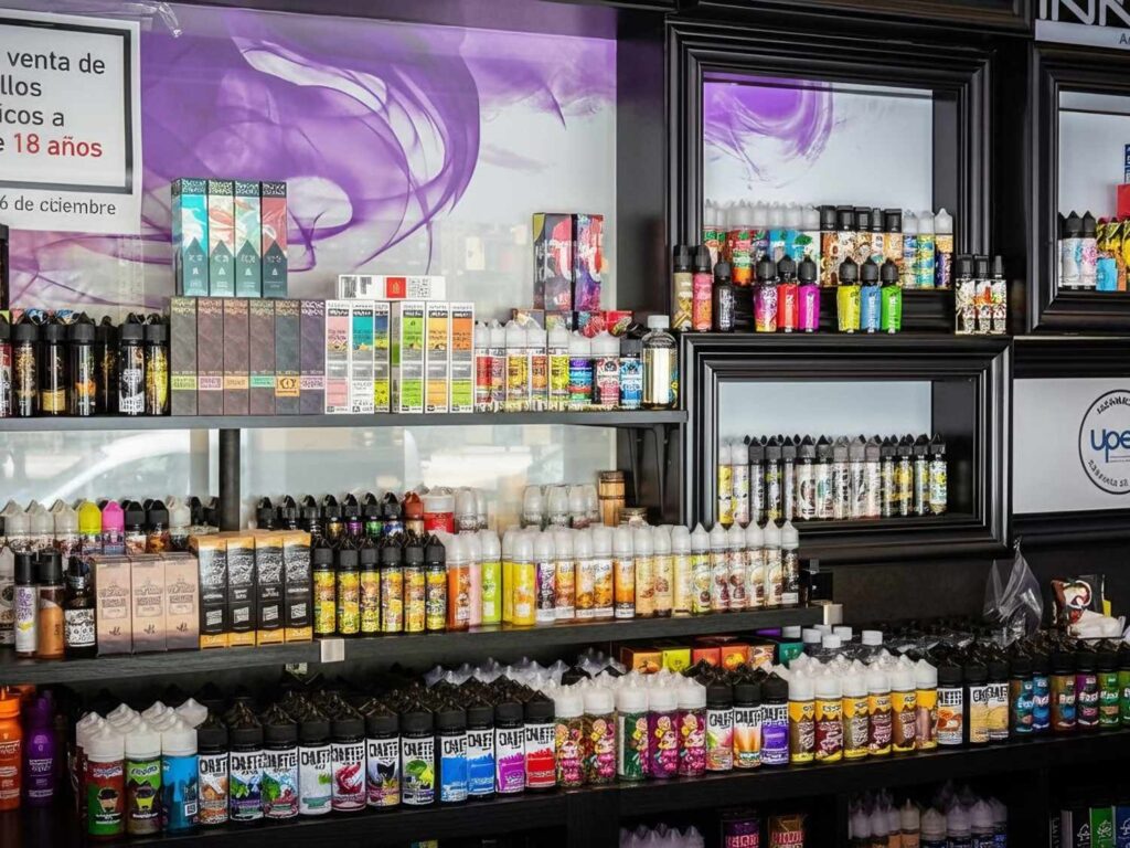 Colorful vape devices and e-liquids neatly displayed at CBD Store Sapulpa, offering a wide range of premium CBD and vaping supplies locally.