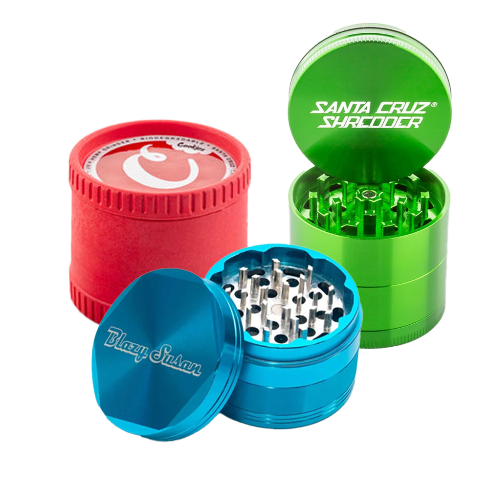 Cookies stash jar Santa Cruz Shredder green and Blazy Susan blue grinder at head shop near Tulsa