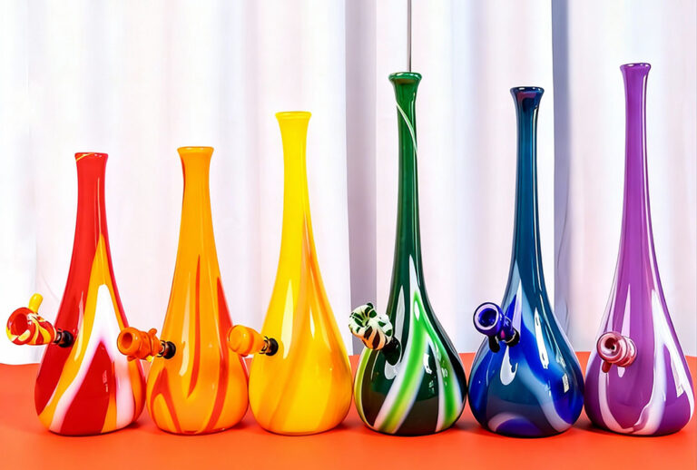 Rainbow collection of premium hand-blown glass bongs displayed at Smoke Store Broken Arrow.