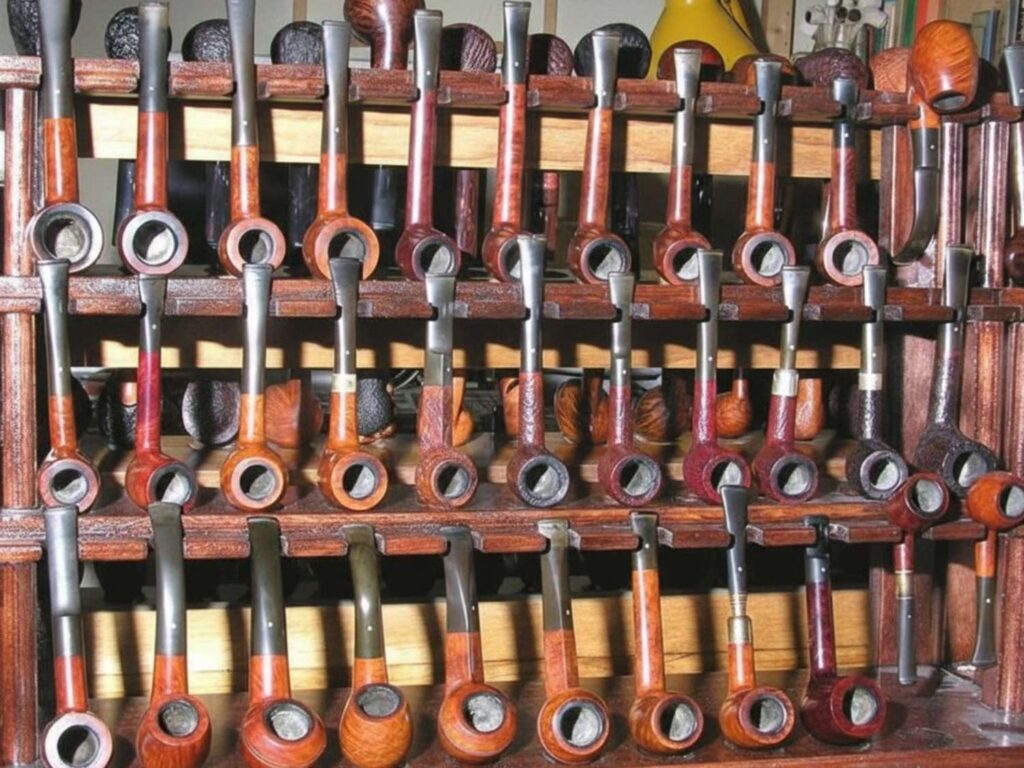 Variety of wooden pipes neatly arranged at Glass Pipes Tulsa, showcasing top-notch smoking gear for enthusiasts nearby.