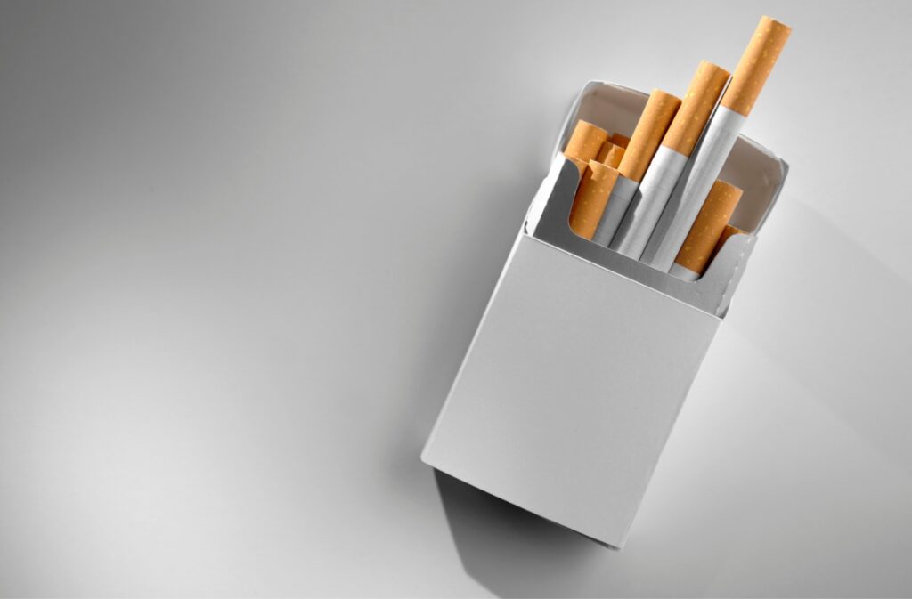 Open pack of cigarettes and electronic cigarettes at a premium Cigarette Shop Tulsa store.