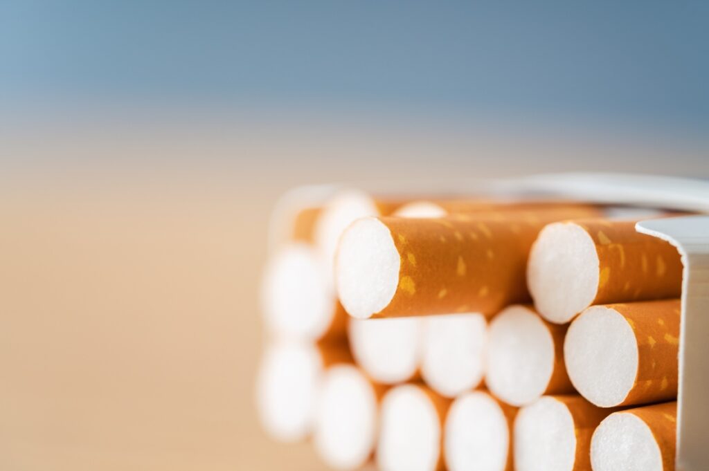 Macro shot showing the textured filters of a new pack of cigarettes, fresh from Cigarette Shop Tulsa.