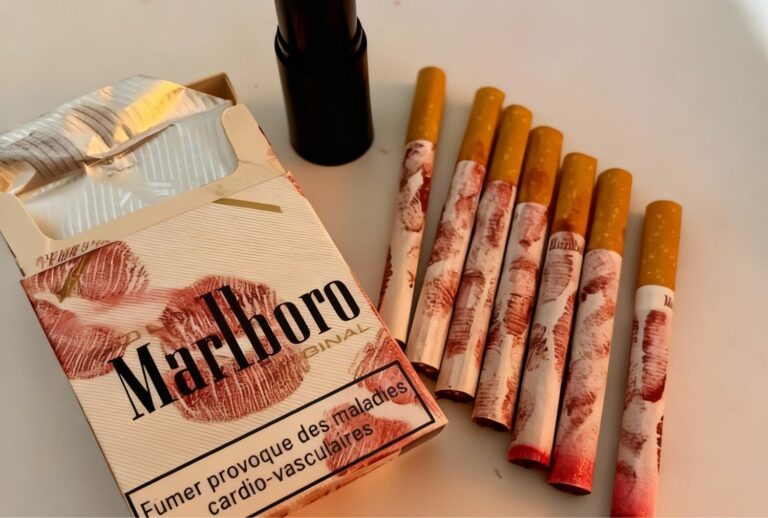 Marlboro Original cigarettes with French health warnings on pack and sticks at Cigarette Shop Tulsa, emphasizing risks.