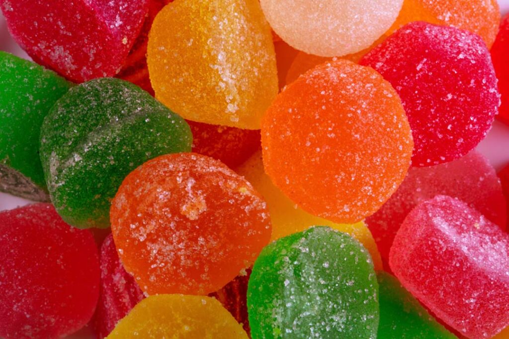Close-up of mixed fruit-flavored Delta 8 gummies at premium Delta 8 store Broken Arrow.