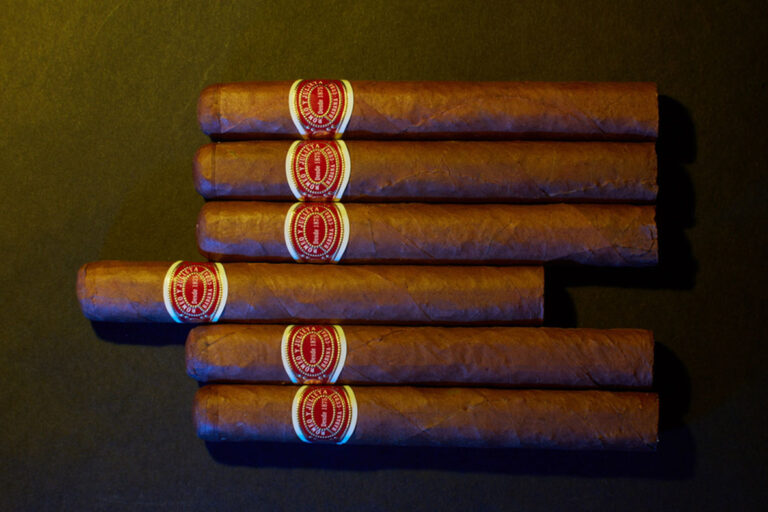 Luxurious bundle of premium Romeo y Julieta Cuban cigars available at tobacco store Sapulpa, with distinctive red and white Habana bands.