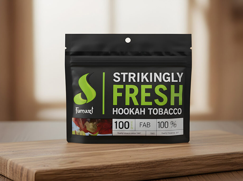 100g pouch of Fumari FAB flavor hookah tobacco displayed on a wooden surface at our local shisha store tulsa.