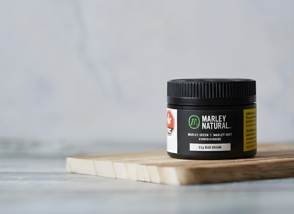 Marley Natural Blue Dream Marley Green cannabis flower jar displayed at a high-quality smoke shop Tulsa location.