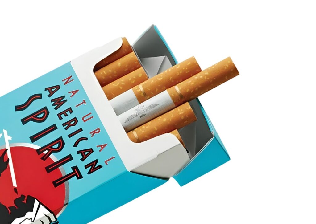 Close up of American Spirit cigarettes in a turquoise box from a tobacco store Houston featuring the iconic logo.