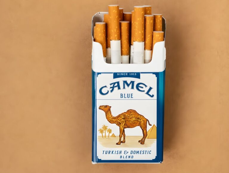 Close up of Camel Blue cigarettes with iconic camel logo from a tobacco store Houston featuring Turkish blend tobacco.
