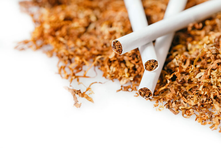 Shredded loose tobacco and finished pre-made cigarettes for sale at a local tobacco shop Tulsa.