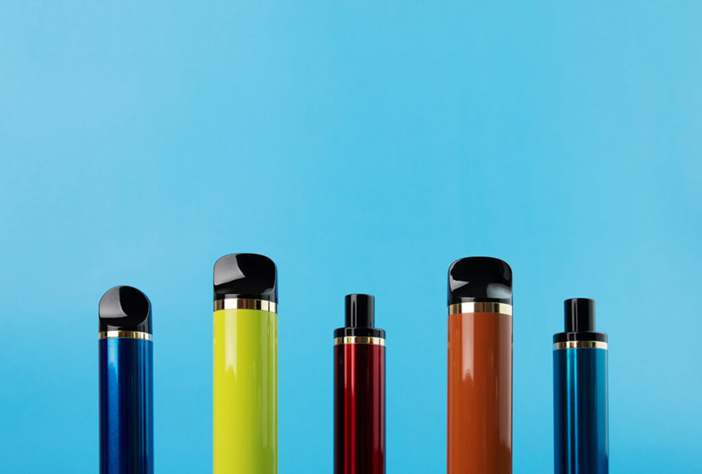 Retail display of popular disposable vapes Tulsa brands, featuring a wide variety of flavors and puff counts.