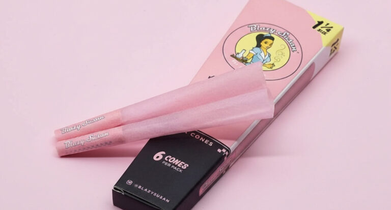 Pink Blazy Susan pre-rolled cones and packaging at a smoke shop Tulsa for a slow-burning and vegan smoking experience.