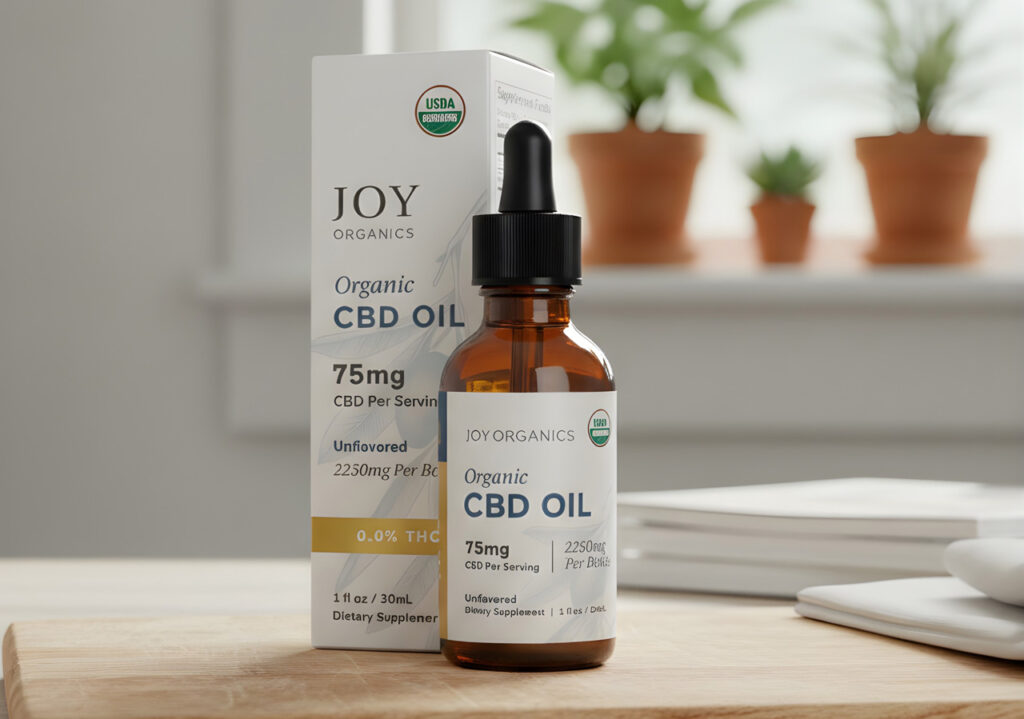USDA Organic 75mg CBD oil bottle and box on a bright counter, now available at our premium CBD store Owasso.