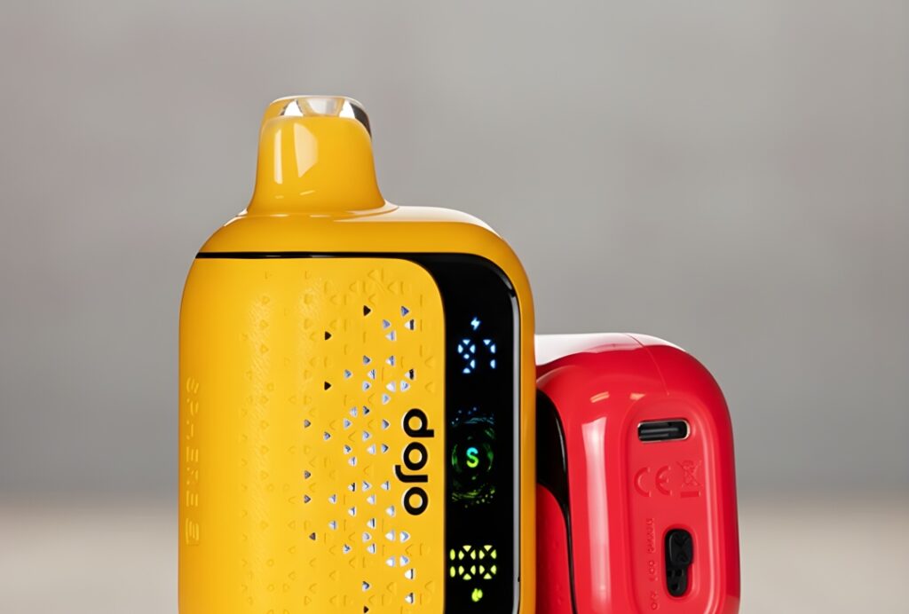 Yellow Dojo disposable vapes Tulsa with digital battery display and USB-C port shown in a high-detail close-up view.