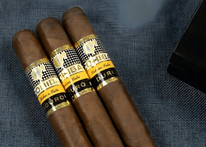 High quality Cohiba Maduro 5 luxury cigars in stock at a cigar shop Owasso featuring dark wrappers and rich aromas.