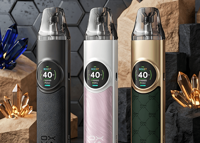 Three sleek OXVA vape pod systems displayed with blue and gold crystals at a top-rated smoke shop Houston store.