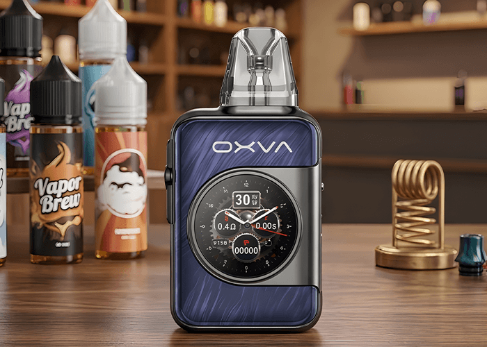 Large OXVA vape mod with digital display next to cloud mist e-liquid bottles at a local smoke shop Houston shop.