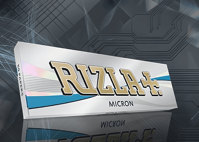 Close up of Rizla Micron silver rolling papers pack on tech background, ultra thin rolling papers Tulsa retail.