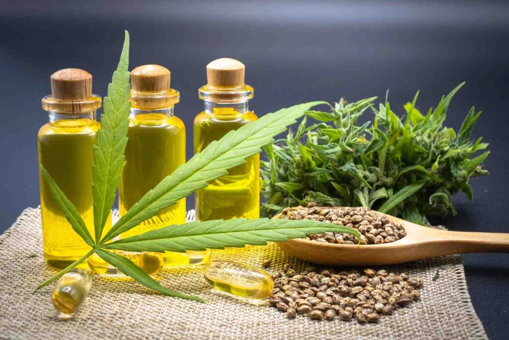 Natural hemp capsules and oil tinctures displayed on burlap at a top-rated CBD store Broken Arrow Oklahoma. 