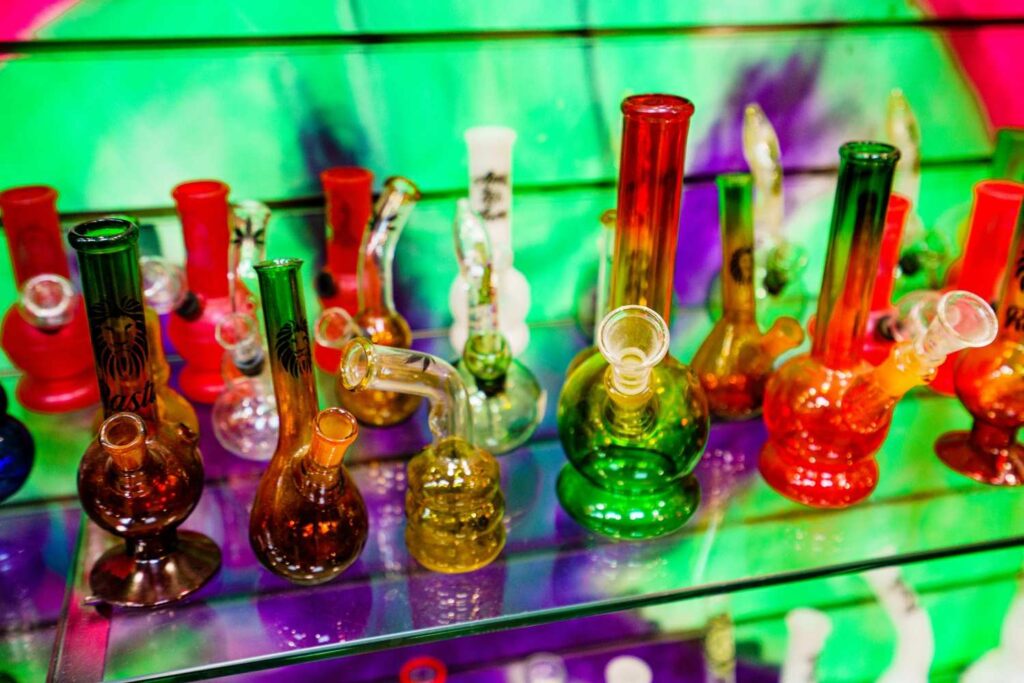 Colorful mini glass bubblers and water pipes on display at a premier head shop Houston for high quality glassware.