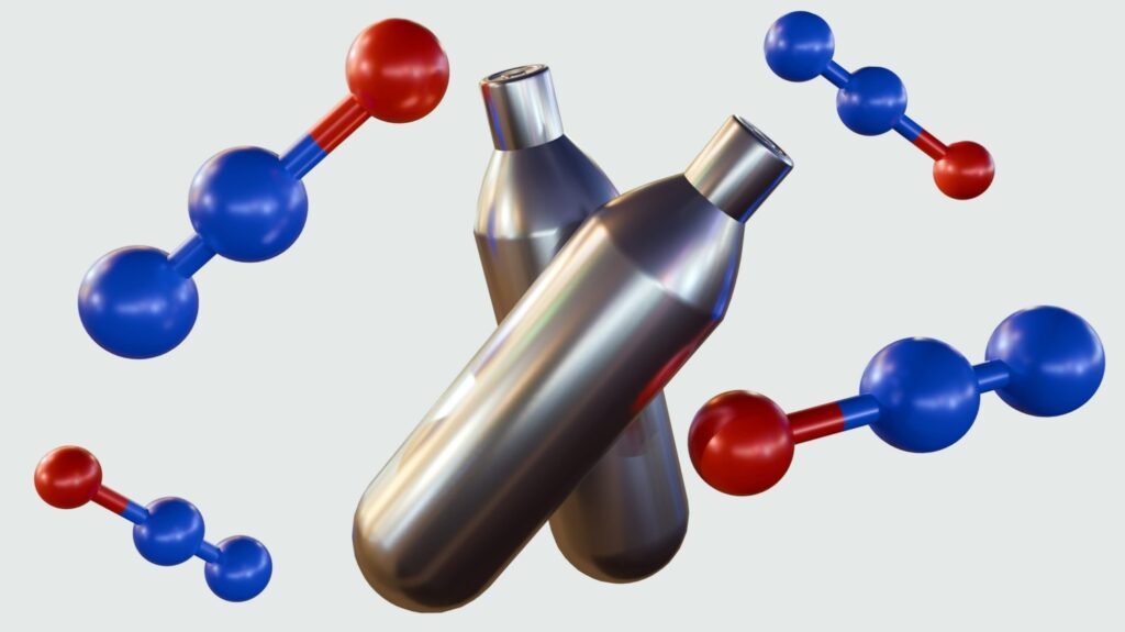 3D render of n2O Owasso nitrous oxide molecules surrounding two metallic cream charger canisters.
