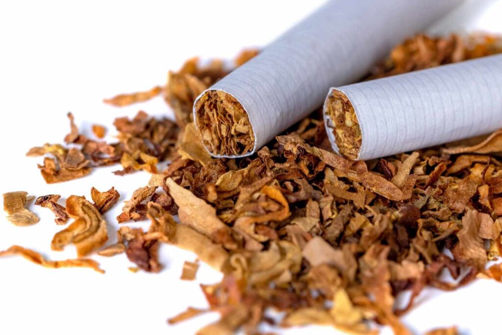 Close up of cigarettes and loose leaf tobacco available at a tobacco shop Tulsa.
