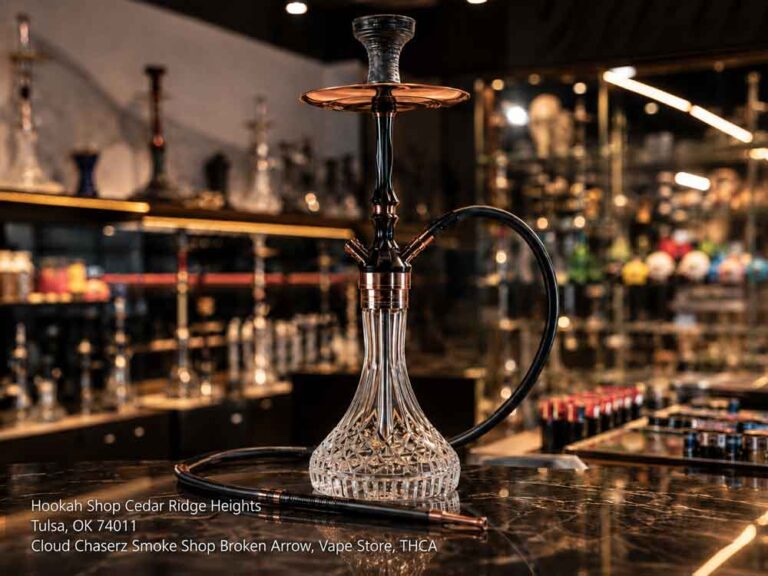 Elegant crystal glass water pipe on display at a luxury hookah shop Broken Arrow with copper accents and shelves.