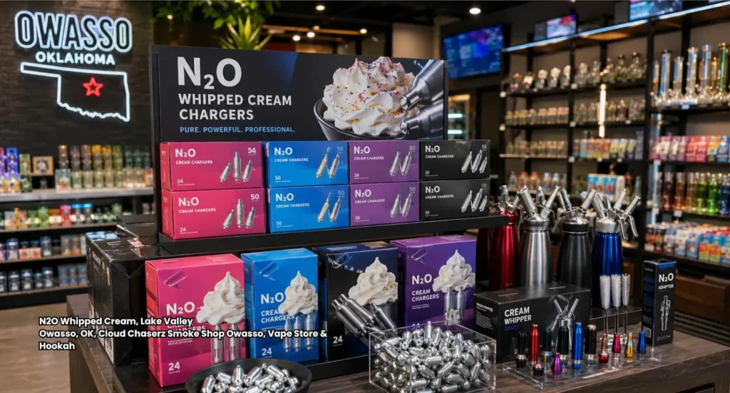Box of N2O whipped cream chargers next to a warm coffee beverage and dispenser in Owasso Oklahoma kitchen setting