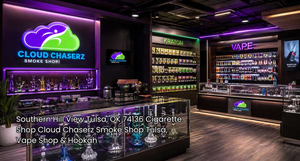 Modern cigarette shop Tulsa interior with Cloud Chaserz displays, glass cases, vape products, hookahs, and neon lighting.