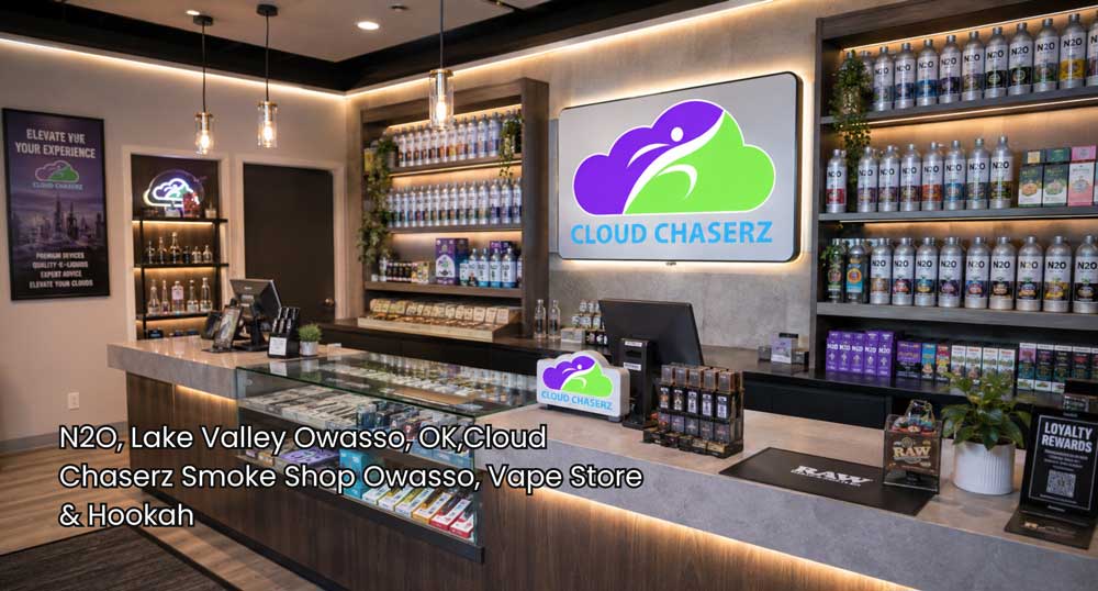 Clean Cloud Chaserz counter stocked with N2O chargers and branded displays, highlighting a polished n2O Owasso shop.