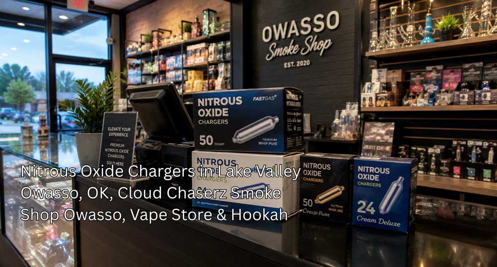 Boxes of FastGas and Cream Deluxe nitrous oxide chargers owasso arranged neat on a glass store checkout counter.