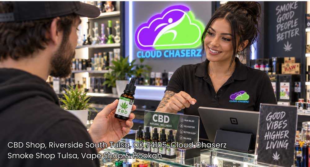 Friendly associate assisting a customer with tincture options at Cloud Chaserz, a trusted CBD shop Tulsa shoppers love.