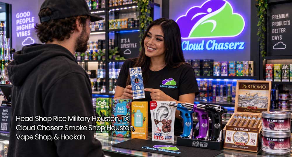A friendly store clerk helping a customer select smoking accessories inside a premier head shop Houston locals trust.